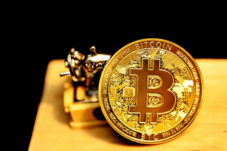 Gold Hits Record $5K While Bitcoin Struggles To Keep Pace