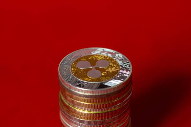 Coinbase And Ripple CEOs Reportedly Meet Howard Lutnick Over CLARITY Act